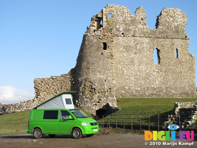 SX12380 Our green VW T5 campervan with popup roof up at Ogmore Castle